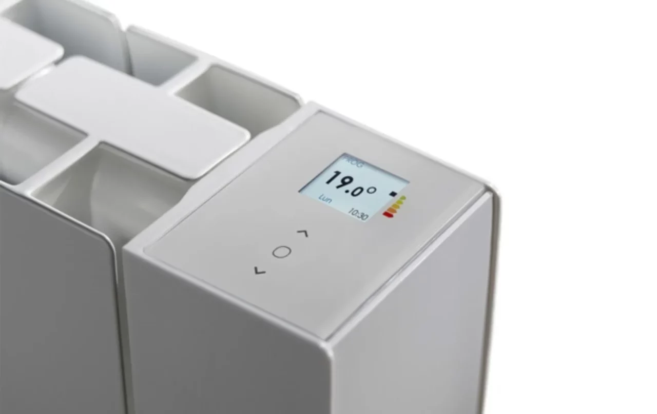 Installation d’un radiateur à inertie par H48 Plomberie.